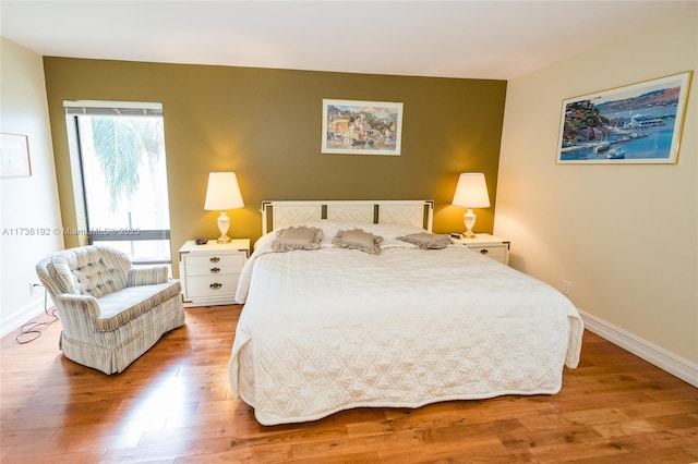 6619 Burning Wood Dr Unit 274, Boca Raton, FL 33433 - bedroom featuring wood finished floors and baseboards