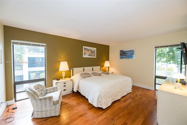 6619 Burning Wood Dr Unit 274, Boca Raton, FL 33433 - bedroom with light wood-type flooring and baseboards