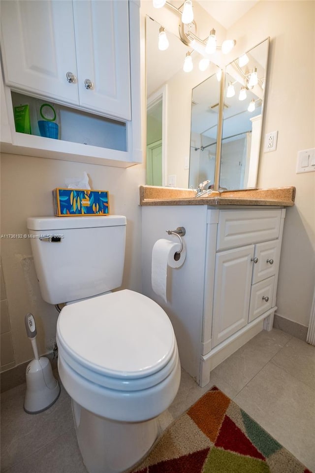 6619 Burning Wood Dr Unit 274, Boca Raton, FL 33433 - bathroom featuring toilet, tile patterned flooring, vanity, and baseboards