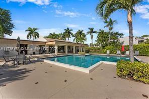 6619 Burning Wood Dr Unit 274, Boca Raton, FL 33433 - bathroom with tile patterned floors, vanity, toilet, and a shower with shower curtain