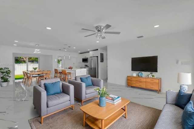 living room with ceiling fan