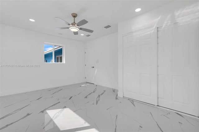 unfurnished room featuring ceiling fan