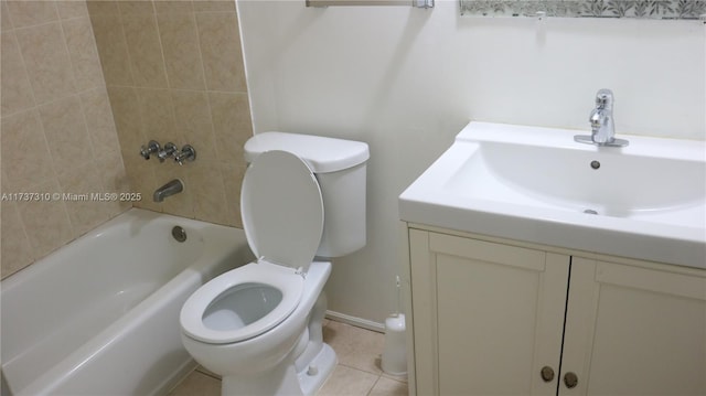 full bathroom with tile patterned flooring, sink, tiled shower / bath, and toilet