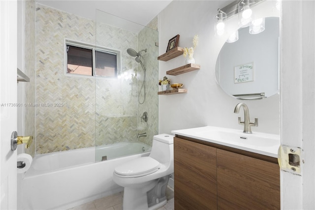 full bathroom featuring vanity, tile patterned flooring, tiled shower / bath combo, and toilet