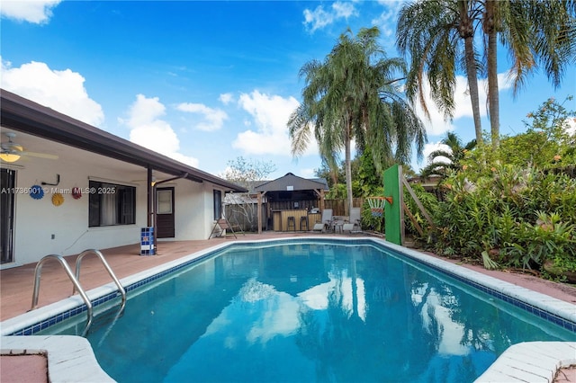 view of swimming pool with a patio area