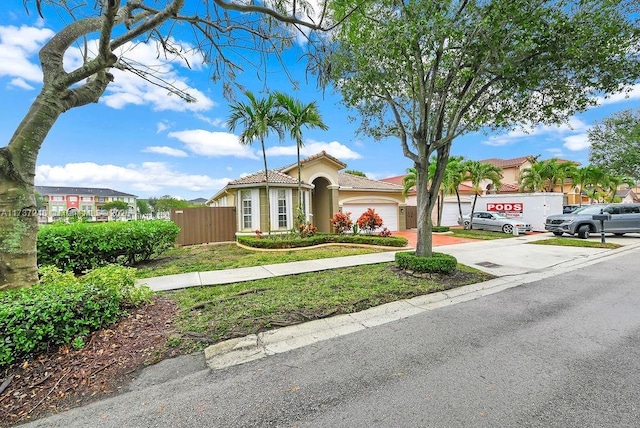 view of front of property featuring a garage