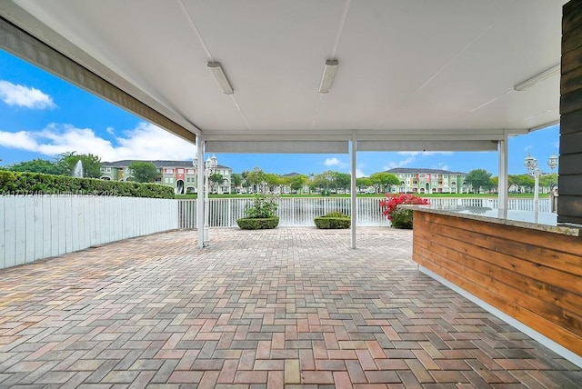 view of patio / terrace with a water view