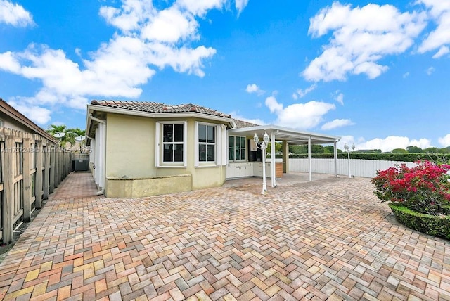 back of house featuring a patio