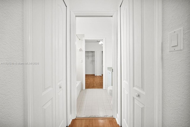 hallway featuring light wood-type flooring