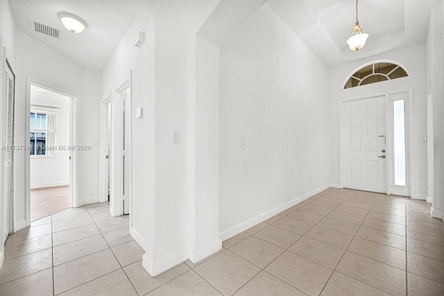 view of tiled foyer entrance