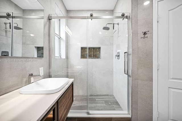 bathroom with vanity and walk in shower