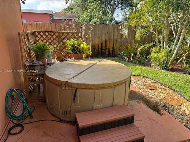 view of patio / terrace featuring a hot tub