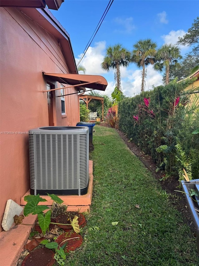 view of yard featuring central AC unit