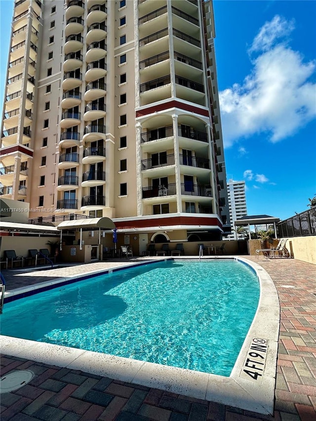 pool with a patio