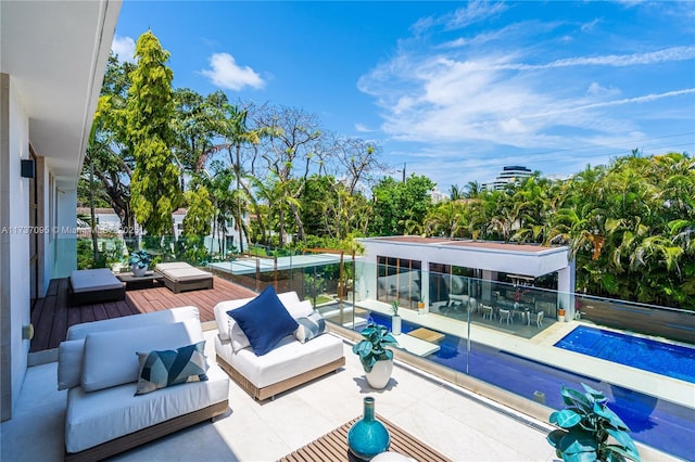 view of pool with an outdoor living space