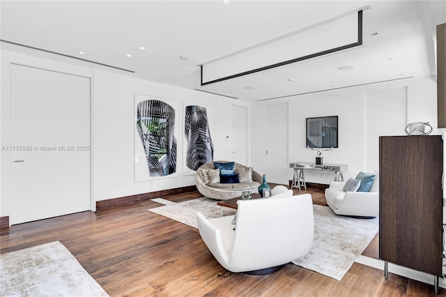 living room with hardwood / wood-style flooring