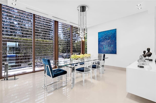 dining space featuring floor to ceiling windows