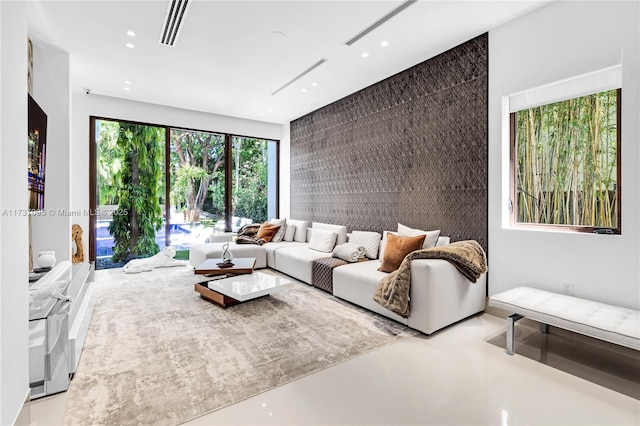 living room with concrete flooring