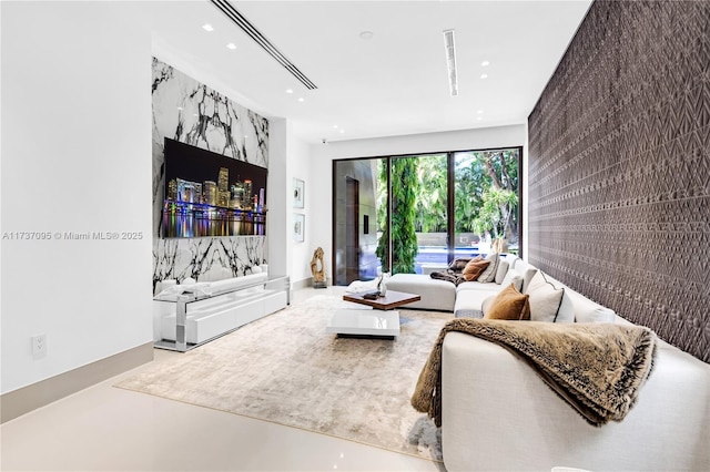 living room featuring concrete flooring