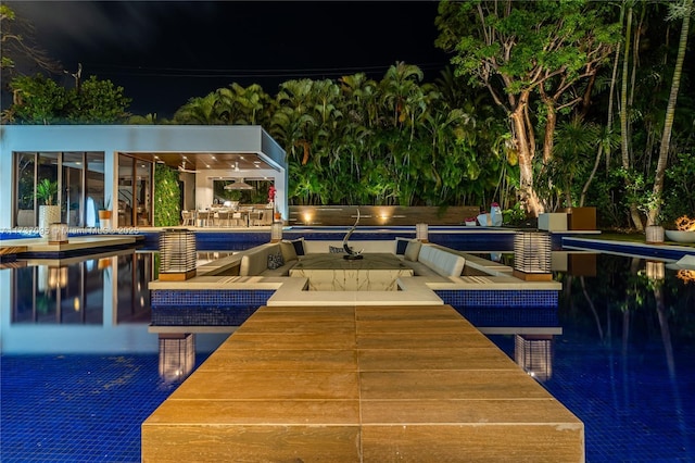 view of swimming pool featuring an outdoor living space