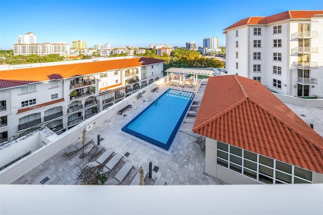 view of swimming pool featuring a pergola