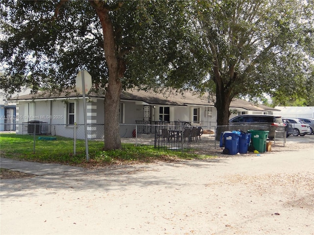 view of front of home featuring central air condition unit