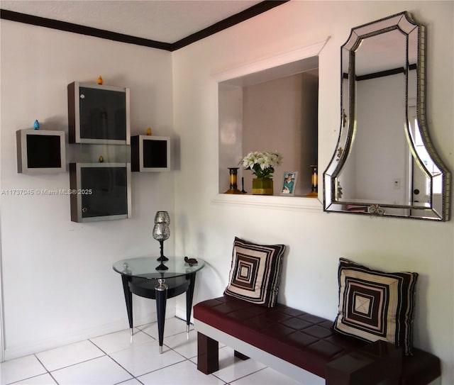 corridor with light tile patterned floors and ornamental molding