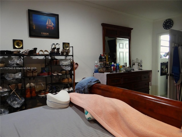 bedroom featuring ornamental molding