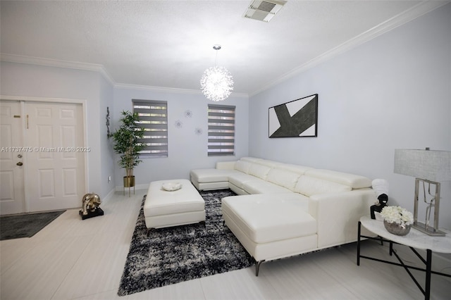 living room with an inviting chandelier and ornamental molding