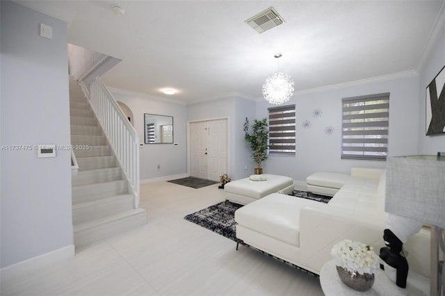 living room with a notable chandelier and ornamental molding