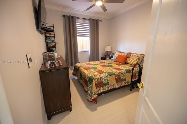 bedroom with ceiling fan and ornamental molding