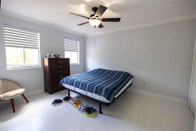 bedroom with multiple windows, crown molding, and ceiling fan