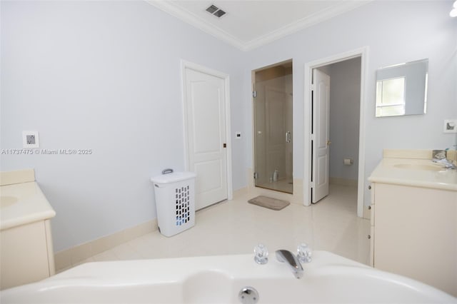 bathroom with crown molding, tile patterned floors, vanity, and walk in shower