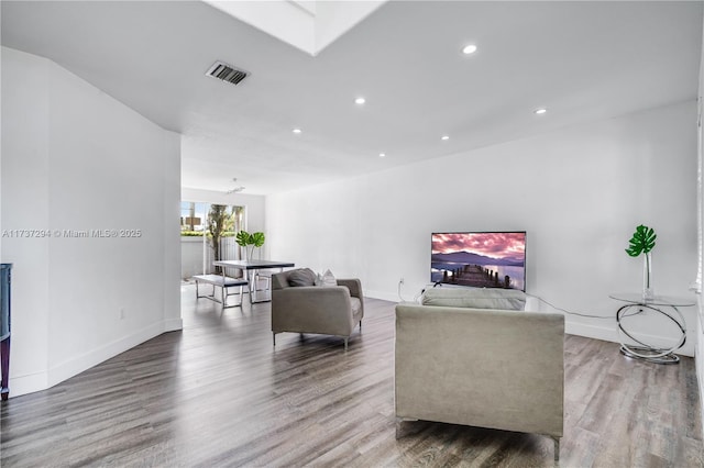 living room with wood-type flooring