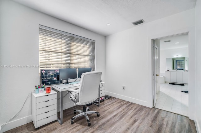 office area featuring light hardwood / wood-style floors