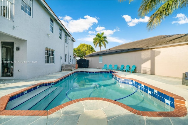 view of pool with a patio area