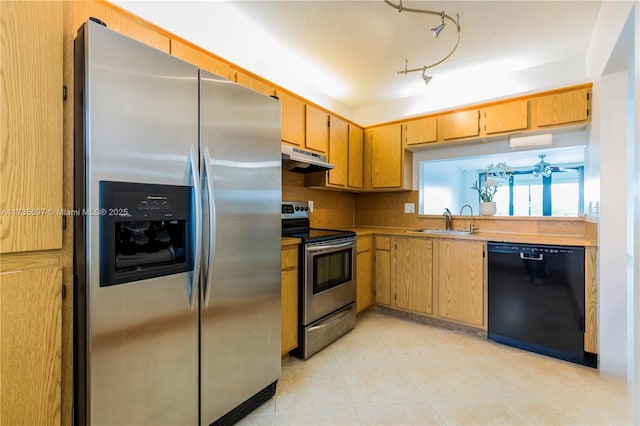 kitchen featuring appliances with stainless steel finishes, sink, light tile patterned floors, ceiling fan, and track lighting