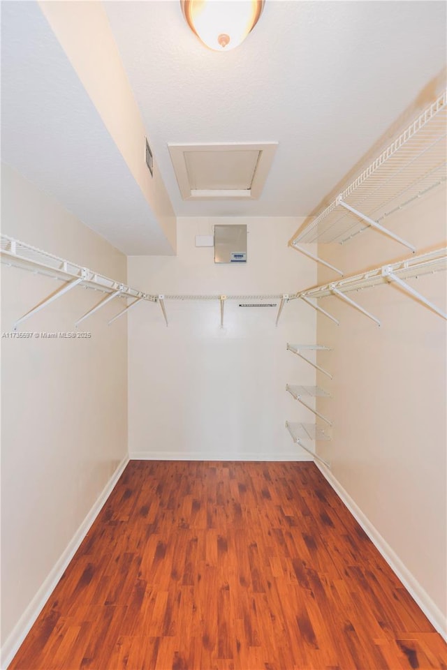 11312 Taft St Unit 11312, Pembroke Pines, FL 33026 - spacious closet featuring wood finished floors