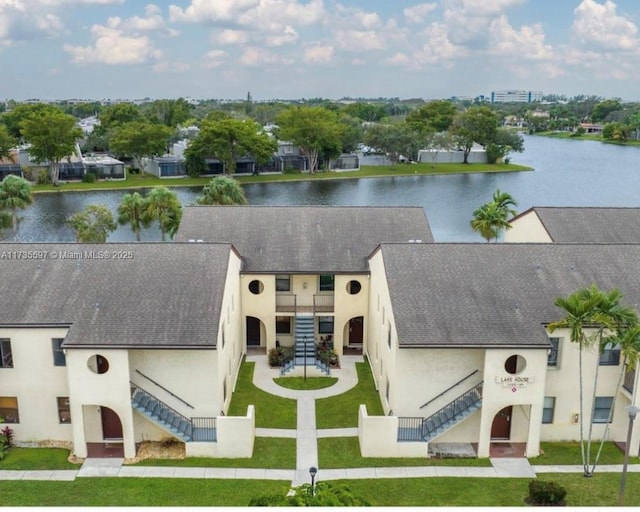 drone / aerial view featuring a water view