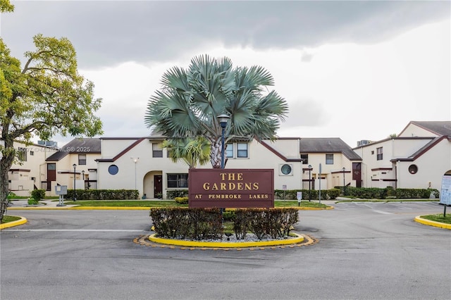 11312 Taft St Unit 11312, Pembroke Pines, FL 33026 - community sign featuring a residential view and uncovered parking