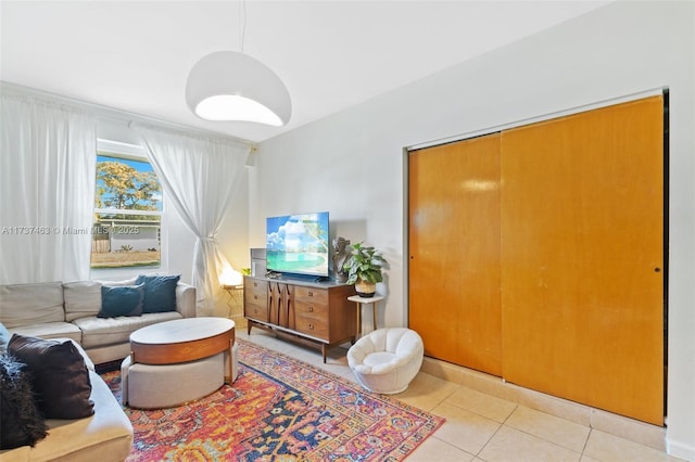 living room featuring light tile patterned floors