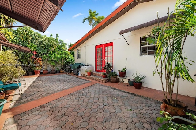 view of patio / terrace featuring french doors