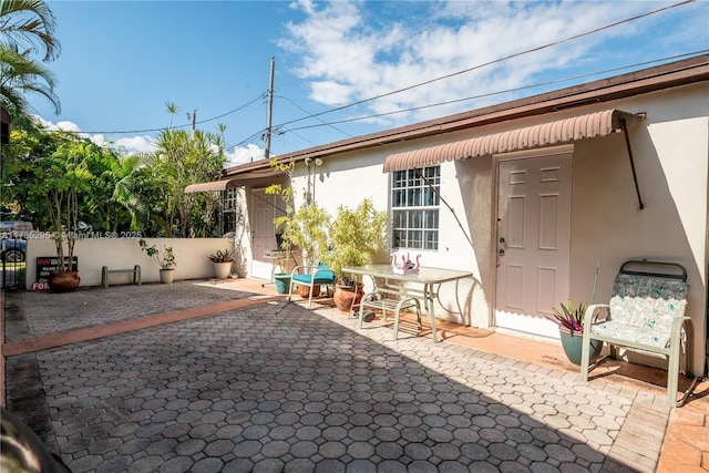 view of patio / terrace with fence