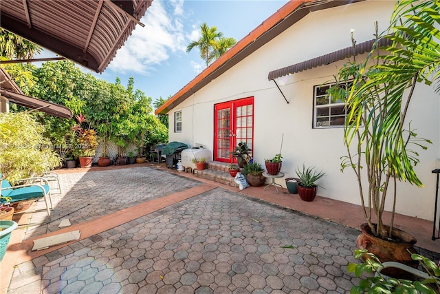 view of patio / terrace featuring french doors