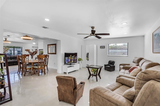 living room featuring ceiling fan