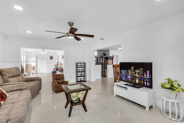 living room featuring ceiling fan