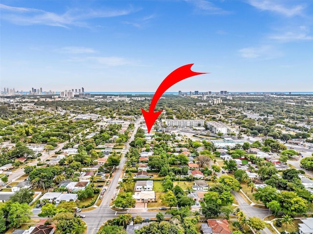 birds eye view of property with a city view