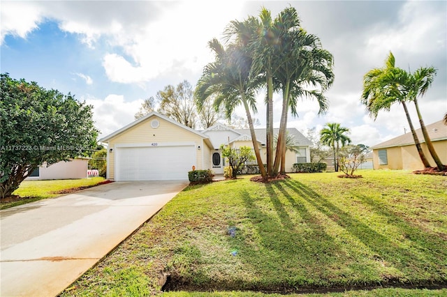 ranch-style house featuring a garage and a front lawn