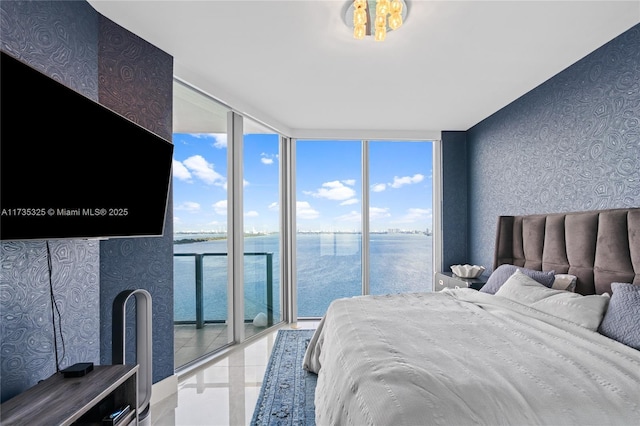 tiled bedroom with floor to ceiling windows