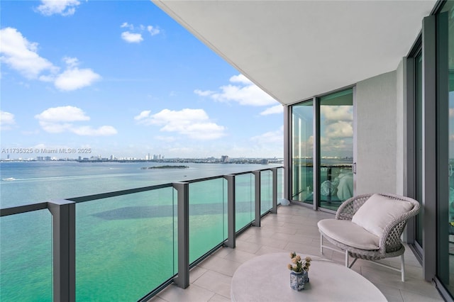 balcony featuring a water view